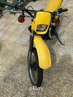 Classic 1986 Yellow Suzuki TS50X motorcycle 50cc
