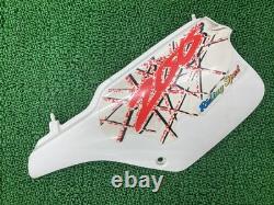 Left side cover, white, 03D, Suzuki TS200R, genuine motorcycle part, SH12A