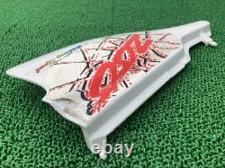 Left side cover, white, 03D, Suzuki TS200R, genuine motorcycle part, SH12A