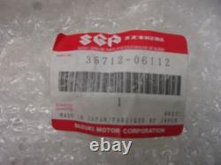 Rear light glass E1571. Suzuki A 100 TS 50 Replacement glass 35712-06112 Rear li