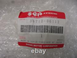Rear light glass E1571. Suzuki A 100 TS 50 Replacement glass 35712-06112 Rear li